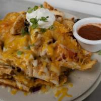 Irish Nachos W/ Chicken · Crisp fried potato chips topped with shredded cheddar cheese, red onions, tomatoes, green on...
