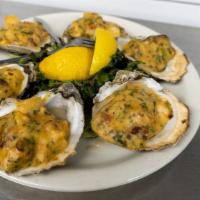 Oysters Graiguenamanagh · Six gulf oysters cooked on the half shell. and topped with a creamy sauce made with. shrimp,...