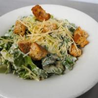 Cooley Caesar Salad · Romaine lettuce tossed with fresh-grated Parmesan cheese, croutons and tangy Caesar dressing.
