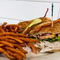 Turkey Sandwich · Oven roasted turkey breast sliced thin topped with Swiss cheese, lettuce, tomato and onion o...