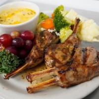 Lamb Chops · Three French cut lamb chops, grilled to perfection, and served with mint sauce.