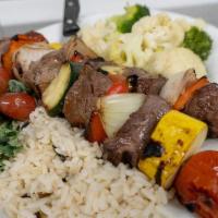 Kebabs · Generous chunks of filet skewered and grilled with squash, tomatoes, onions and peppers. Ser...