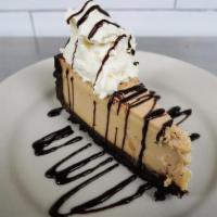 Irish Cream Cheesecake · Luxurious layers of Irish cream cheesecake and rich chocolate ganache
