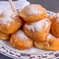 Fried Chinese Donuts (10) 炸包 · Deep-fried buttermilk biscuits served in 10.