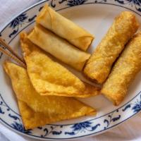 Appetizers Platter For Two · Two Spring rolls, two  egg rolls and two crab rangoons