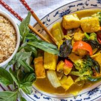 Curry Tofu 大咖喱豆腐 · Mild Spicy Curry Sauce, Fresh Thai Basil, deep Fried Tofu, Potato, Broccoli, Onion, Carrot, ...