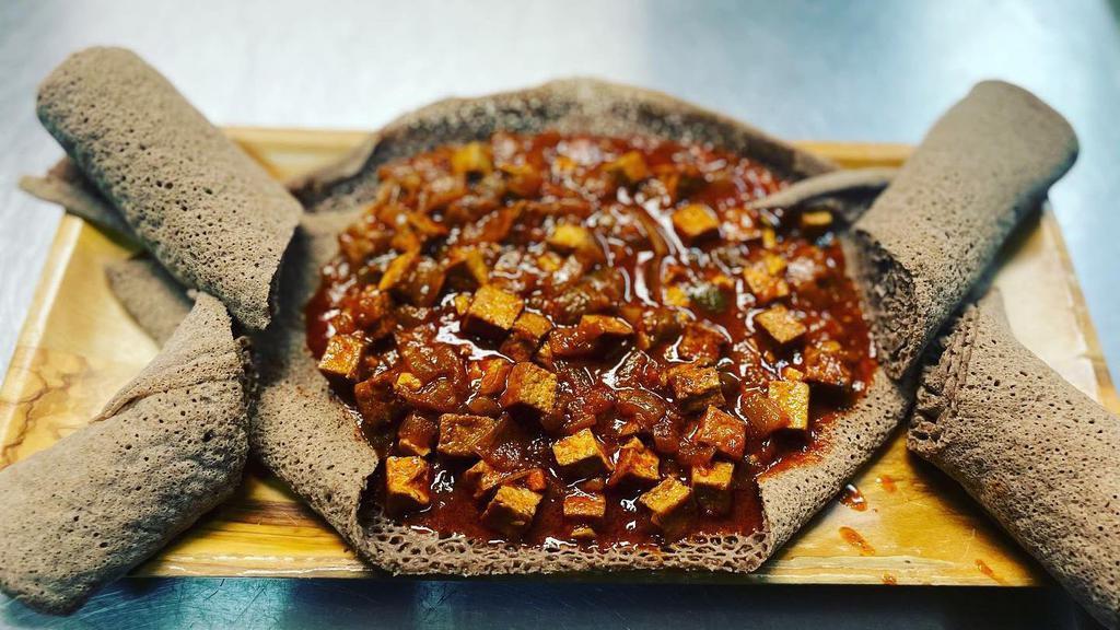 Specialty Tofu · Vegan. Tofu stewed in vegan butter, onions, and spices (hot stews served on injera).