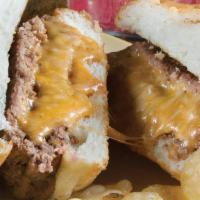 Classic Juicy Lucy · Stuffed with American cheese on a toasted sourdough bun. All juicy's cooked to medium temper...