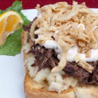 Loaded Pot Roast · Toasted sourdough bread topped with garlic mashed potatoes, melt in your mouth slow-cooked p...