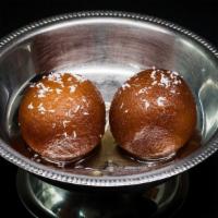 Gulab Jamun · Dough and cheese dumplings, delicately fried, saffron rose syrup.