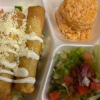 Chicken Flautas · Three corn tortillas stuffed with shredded chicken and deep fried, served over a bed jalapen...