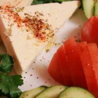 Feta Plate · Vegetarian, gluten free. Feta cheese, cucumbers, tomatoes, and Turkish olives.