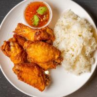 Fried Wings Daddy  · 5 Piece  wings marinade , Served with Sticky Rice and Special Laotian chili Dipping Sauce