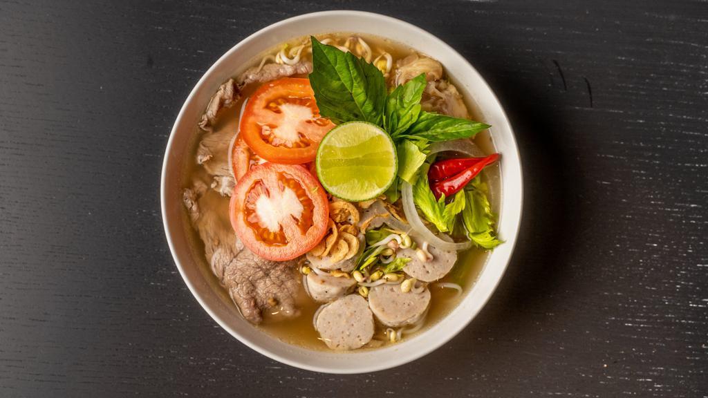 Pho Mommy · Lao Style Homemade Beef broth with Rice noodles,Thin slice eys-round beef,  meat balls,celery,fried onion,tomatoes,onions, bean  sprouts