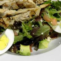 Cobb Salad · Grilled Chicken Breast, Avocado, Bleu Cheese, Bacon, Tomatoes, Egg and Mixed Greens Served w...