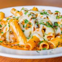 Baked Sausage Piasano · Rigatoni in our Signature Vodka Sauce with Slices of Homemade Italian Sausage & Mushrooms Co...