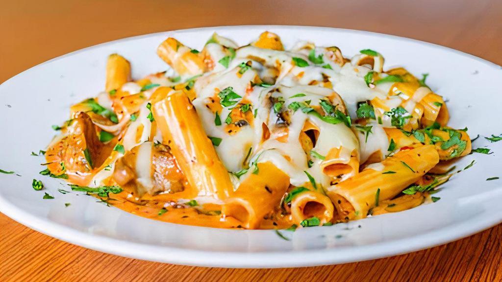 Baked Sausage Piasano · Rigatoni in our Signature Vodka Sauce with Slices of Homemade Italian Sausage & Mushrooms Covered with Mozzarella Cheese