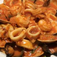 Risotto Pescatore · Clams, Shrimp, Calamari, and Mussels in a Red Sauce