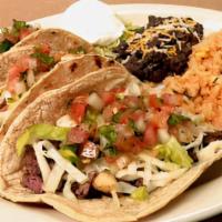 Taco Platter · Your choice of chicken, beef or fish in a flour tortilla topped with Pico de Gallo Served wi...