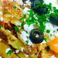 Greek Fries · Large portion. A hefty portion of our fresh cut fries, topped and mixed with Feta cheese, re...