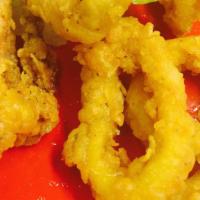 Calamari (Breaded Squid) · A generous portion of baby squid, breaded using our family recipe, cooked until golden brown...