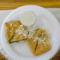 Spanakopita (Spinach Pie)- Large Portion · Yianni's family recipe. Large portion. Fresh spinach mixed with Greek spices and chunks of F...