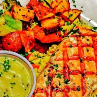 Char-Grilled Lemon Salmon · Chilean salmon chargrilled to perfection, lightly spiced and set on a bed of Greek country r...