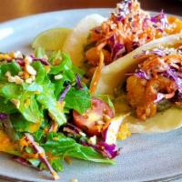 Pop Rocks Tacos · Sweet and spicy shrimp, red cabbage and carrot slaw, smashed avocado, carrot-ginger salad.