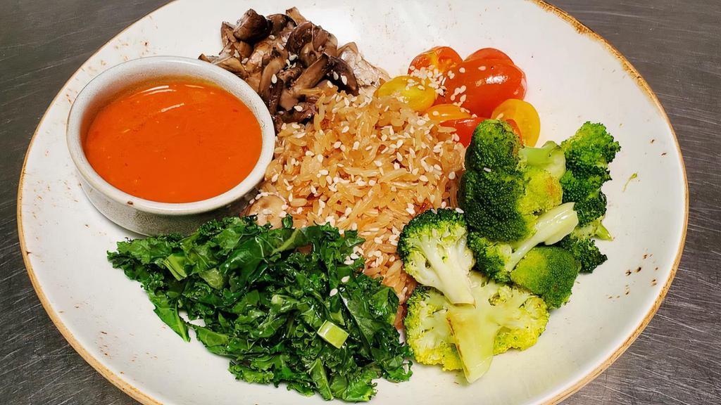 Thai · Garlic fried rice, broccoli, sautéed mushrooms, blistered tomatoes, sautéed kale and cabbage, sambal soy.