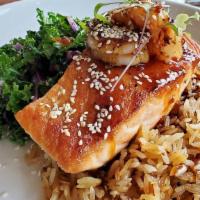 Pan Seared Salmon · Teriyaki glaze, kale, and cabbage, garlic fried rice, grilled shrimp.
