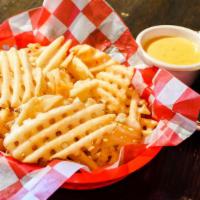 Atomic Cheesy Fries · golden waffle fries, creamy ranch dressing