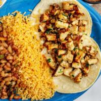 Lupe’S Tacos · Corn Tortillas topped with your choice of fajita beef, fajita chicken, or sautéed fish cooke...