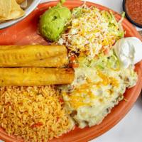 Flautas - Chico (One) · Your choice of shredded beef or shredded chicken rolled in a corn tortilla then fried. Serve...