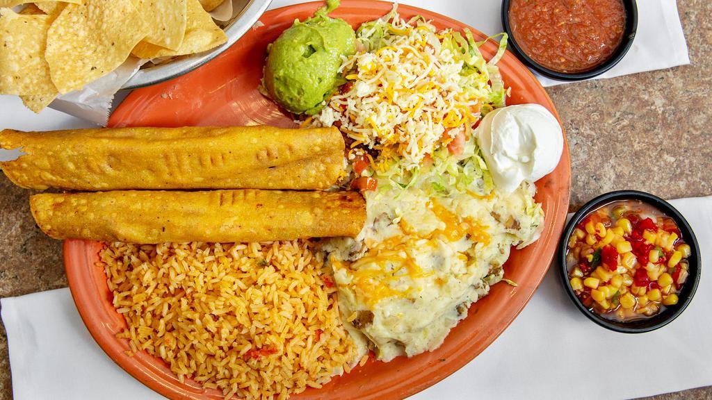 Flautas - Chico (One) · Your choice of shredded beef or shredded chicken rolled in a corn tortilla then fried. Served with Guacamole and Sour Cream.