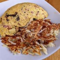 Apple & Date Omelette · A fluffy fresh cracked omelette loaded with. granny apples, ham, bacon, cream cheese. and sw...