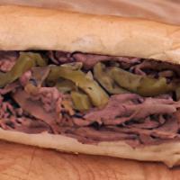 Italian Beef Sandwich · Italian beef served on toasted French bread and slightly dipped in natural beef gravy.