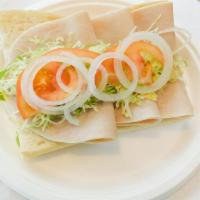 Turkey And Cheese Sub · Oven roasted sliced turkey breast with swiss cheese topped with mayonnaise, lettuce, tomatoe...