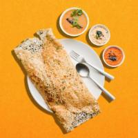 Simple Semolina · Crispy golden semolina crepe served with a lentil soup, a tangy tomato, and classic coconut ...