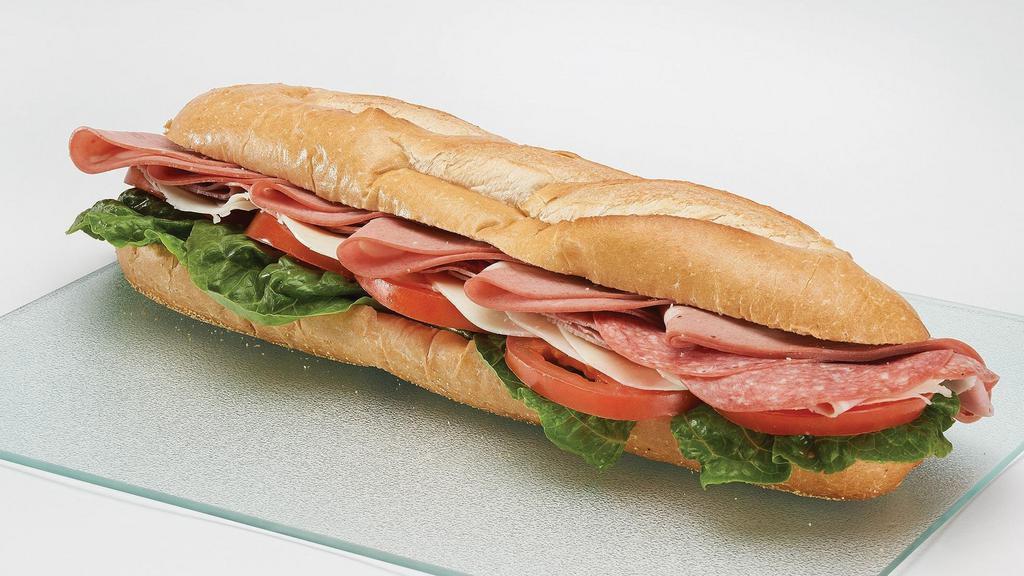 Italian · Premium genoa salami, cooked ham and pepperoni with lettuce and tomato on a 12