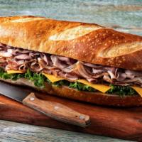 Turkey & Cheese Sub · Oven Roasted Turkey Breast, Swiss Cheese with Lettuce and Mayonaise on Fresh Baked French Br...