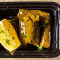 Grape Leaves (6 Pcs) · Grape Leaves stuffed with rice, tomatoes, onion & olive oil.