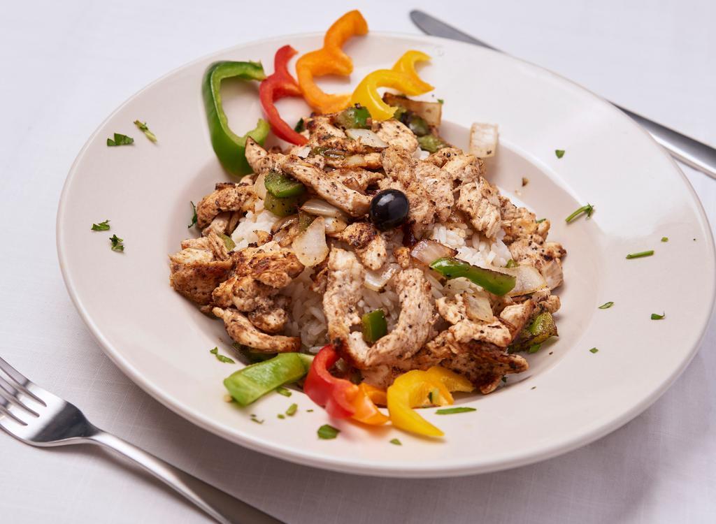 Chicken Shawarma · Served over a bed of rice.