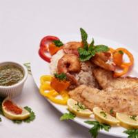 Fried Tilapia & Sautéed Shrimp · Fried tilapia with sautéed shrimp drenched in soy sauce, lemon juice, and vegetables; served...