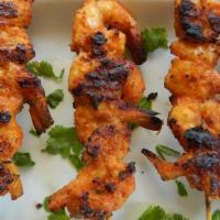 Tandoori Shrimp · Tandoori shrimp, a dish of roasted shrimp marinated in yogurt and generously spiced, giving ...