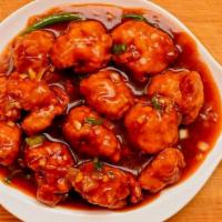 Chicken Manchurian · Delicious fried chicken in slightly sweet, hot & sour Manchurian sauce