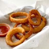 Onion Rings* · Our thick-cut onion rings are made from whole white onions,  letting the onion’s natural swe...