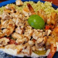 Sizzling Chicken & Shrimp · One marinated chicken breast and five shrimp on a bed of three cheeses, onions and peppers, ...