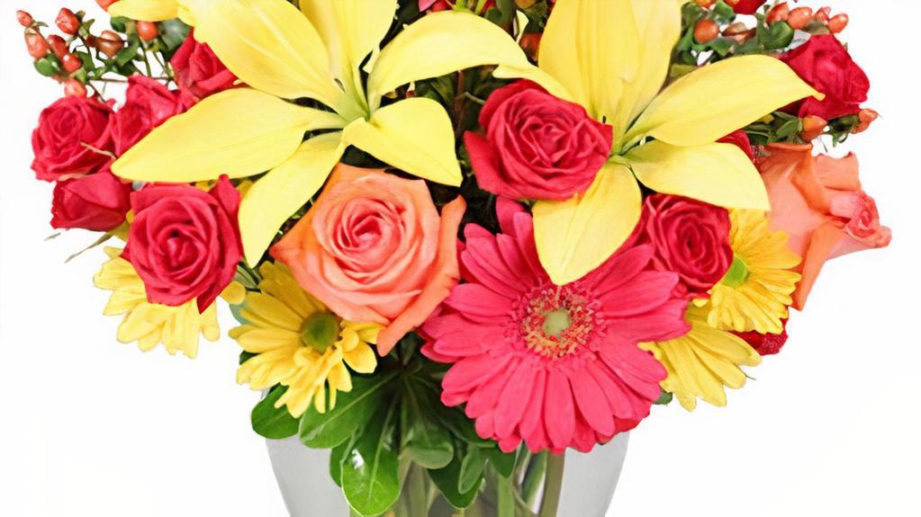 Bring On The Happy · t's time to bring on the happy with these vibrant flowers! Fresh flowers like these are a surefire way to make them smile. With red gerberas, orange roses, yellow lilies and more, there's no better way to brighten up a room. Send these glowing blooms to a loved one to make their day!