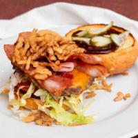Cowboy Burger · Honey BBQ Sauce, Cheddar Cheese, Bacon, Crispy Onion Straws, Lettuce & Tomato.