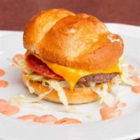 Boss Burger · American Cheese, Lettuce, Tomato, Pickles & 1000 Island Dressing.